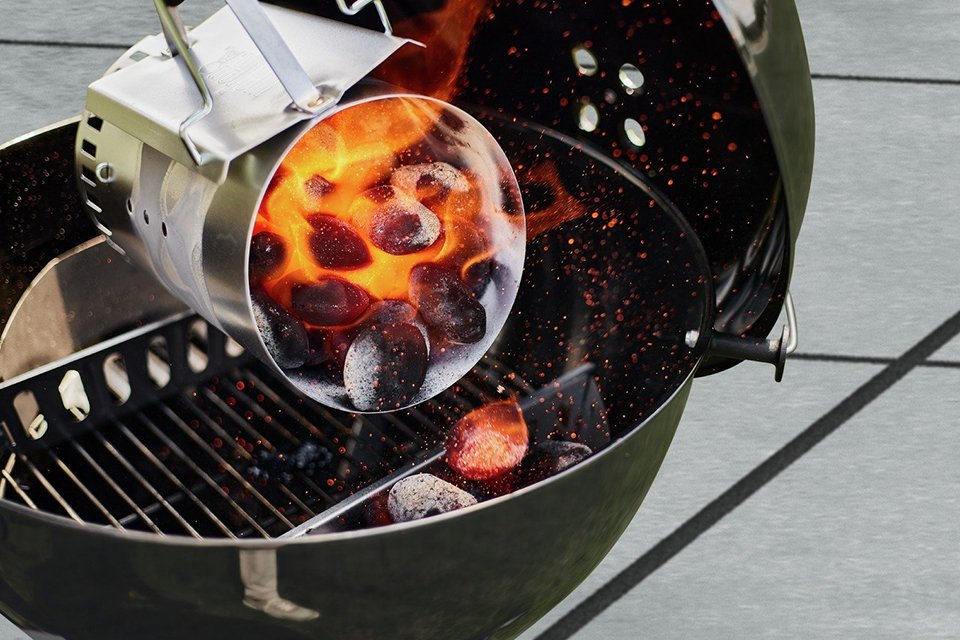 Weber Coconut Briquettes used as fuel for a BBQ.