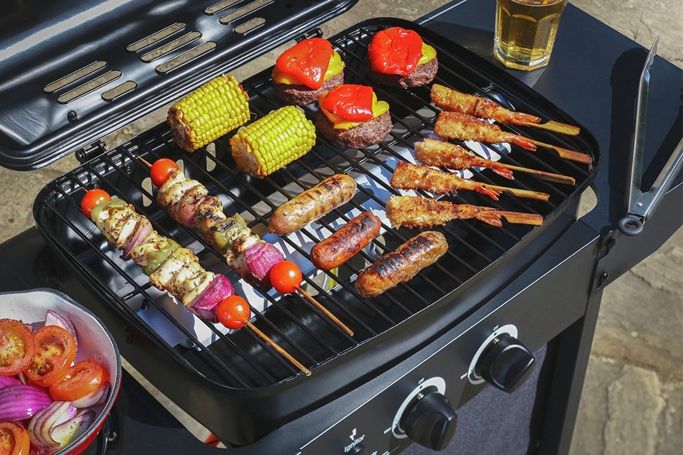 An Argos Home 2 Burner gas BBQ with a side burner.