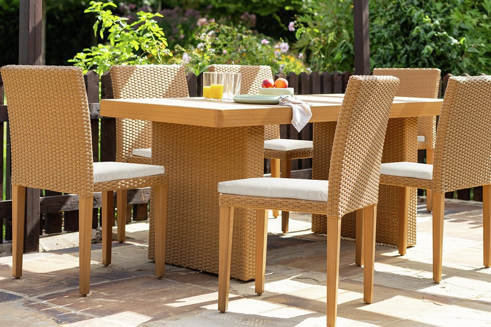 A brown Habitat June 6 seater rattan effect patio set.