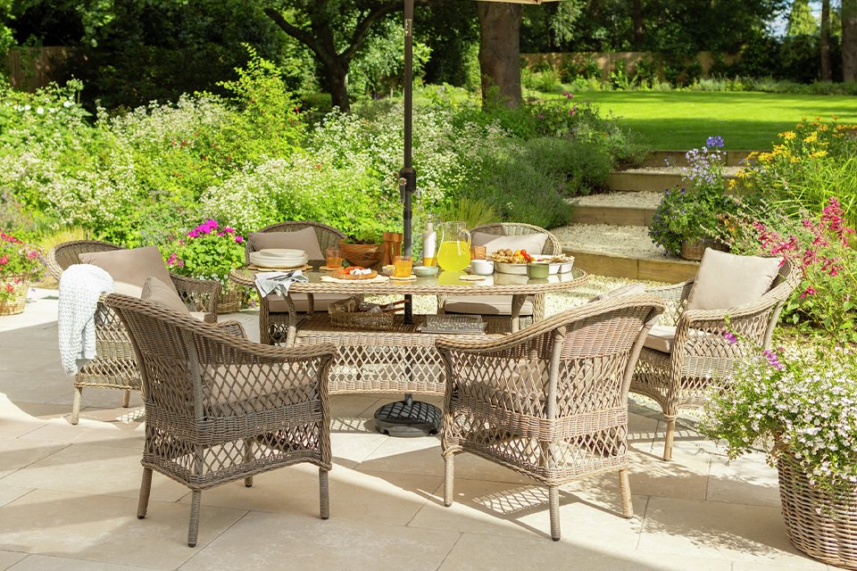 A Habitat Palermo 6 seater rattan effect patio set.