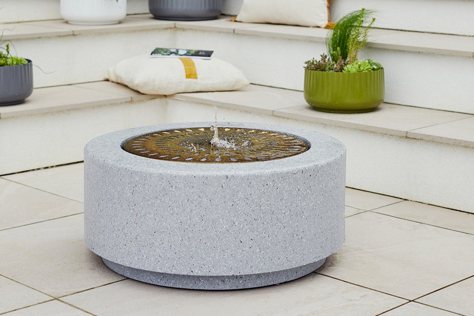 Ivyline Solis large water feature in terrazzo and brass finish.