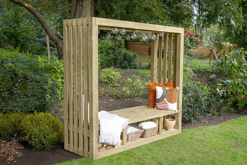 Forest Garden Amalfi 2 seater wooden garden arbour in natural finish placed outdoors.
