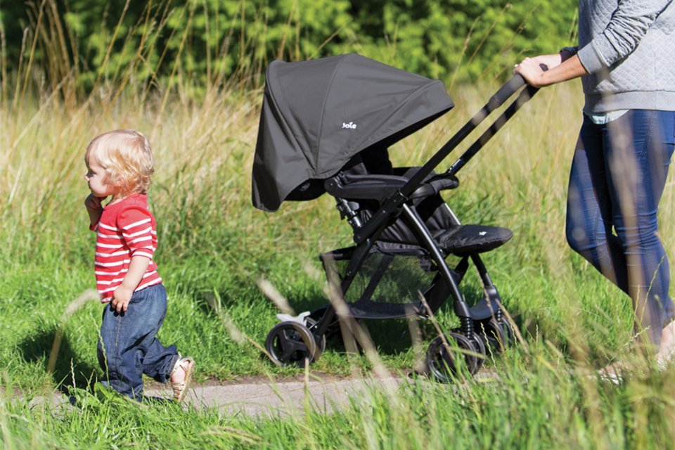 A woman and toddler with Joie Mirus Scenic Reversible Handle Stroller - Ember.