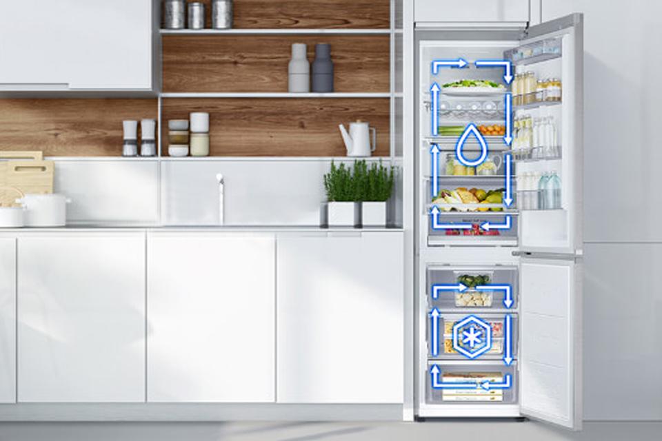 Large kitchen with open fridge.