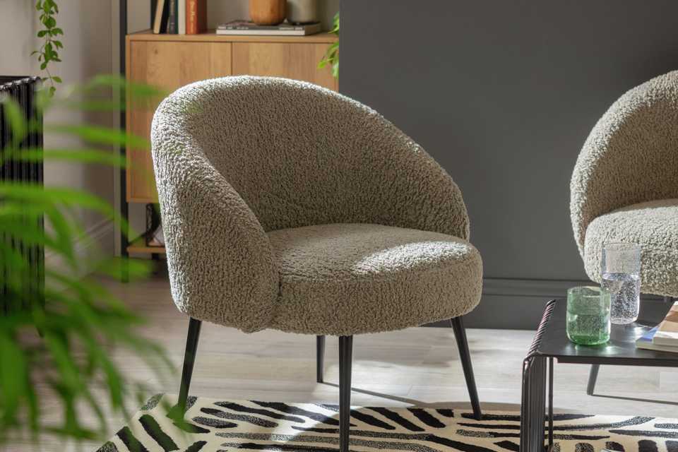 A Habitat ash boucle chair in cream. 