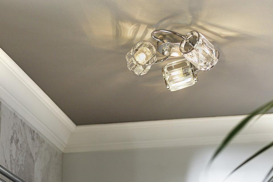 A switched on 3 light bathroom glam ceiling light in chrome.  