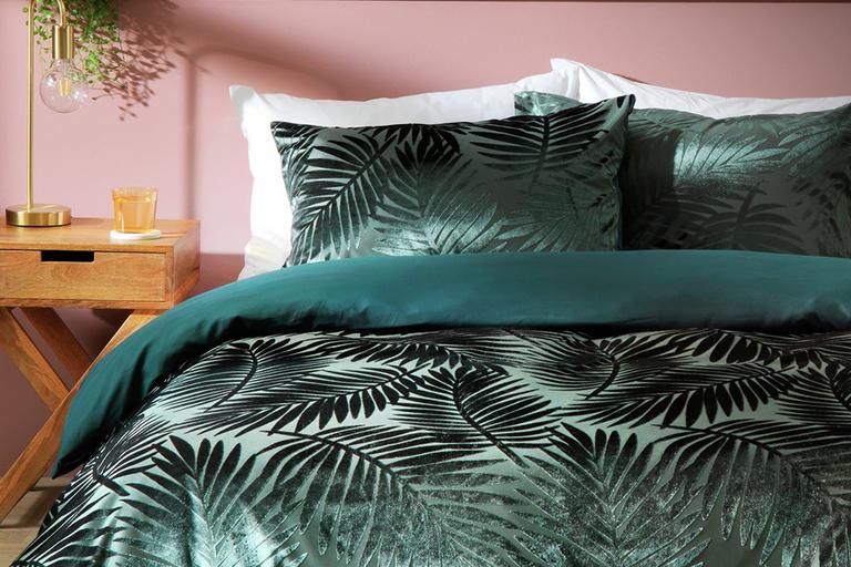 A Habitat global velvet feather bedding on a superking size bed.