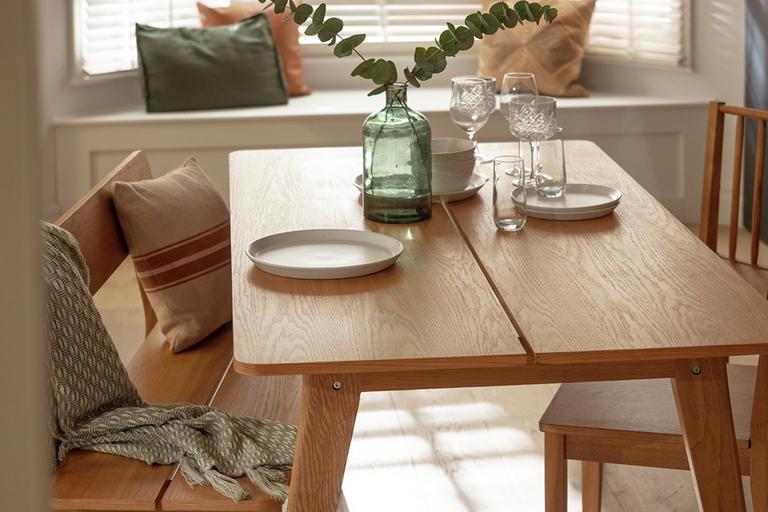 Modern country wooden dining table and chairs.