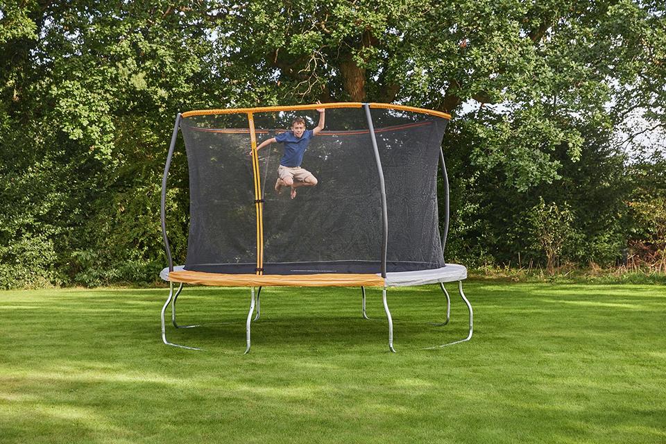 Sportspower outdoor kids trampoline with enclosure.