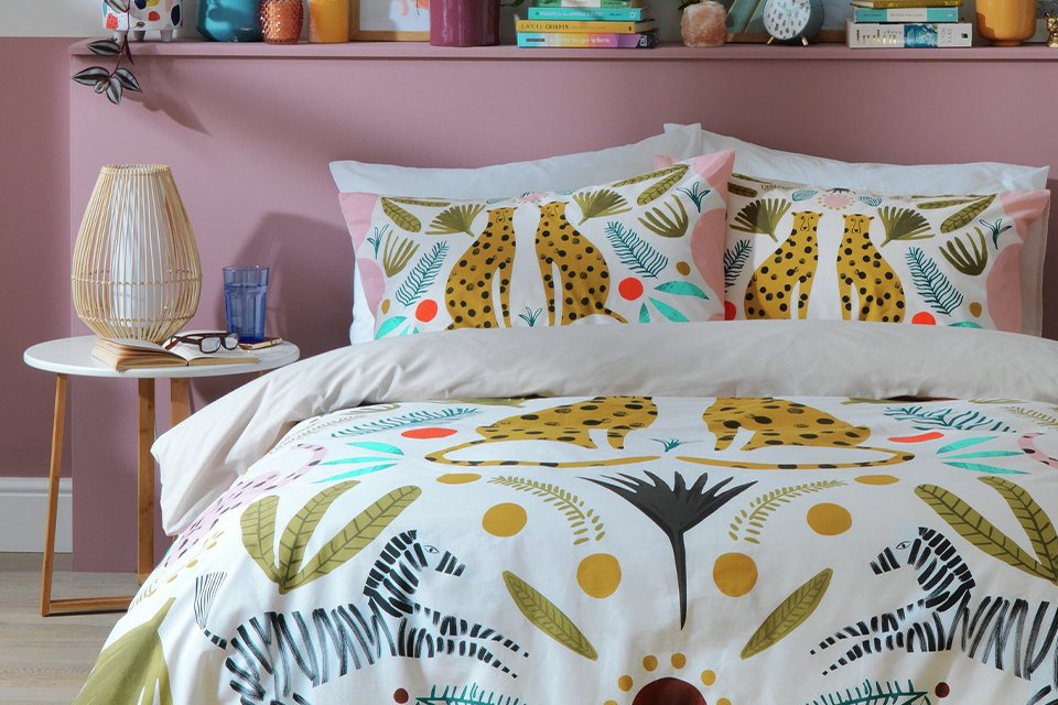 Patterned cheeta print bedding.