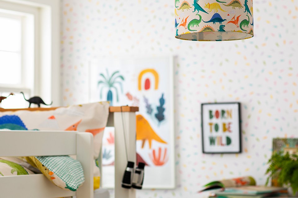 Habitat dino print bedsheet in a kid's room.