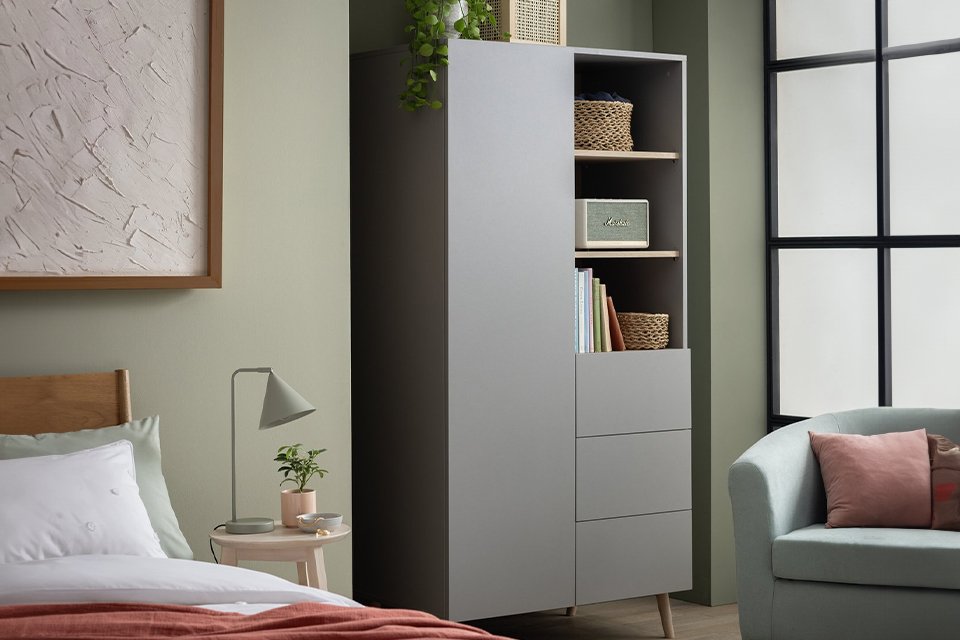 One door wardrobe in bedroom.