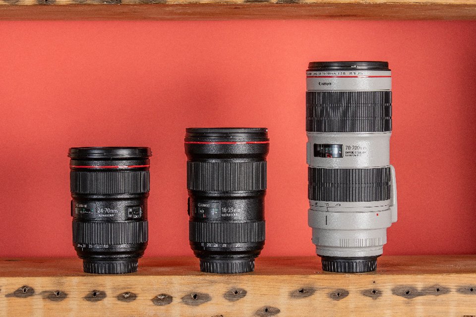 Canon EF and EF-S lenses on display. 