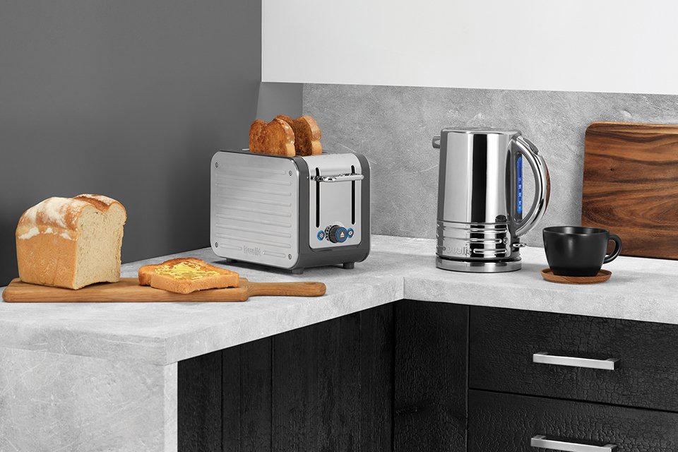 Dualit 2 slot Architect toaster and Architect kettle in grey body with stainless steel panels.