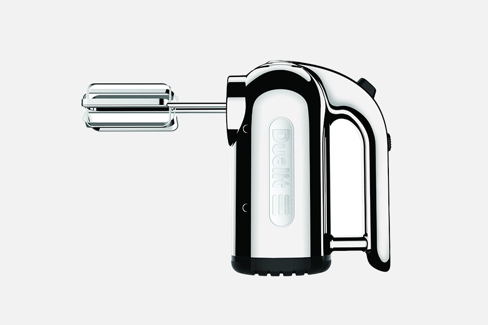 Sideview of a chrome Dualit electric hand mixer. 