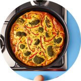 Food being cooked in a pan.