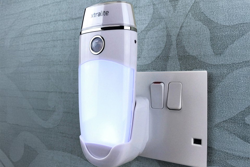 An Xtralite Nitesafe Duo+ Dual Function Night Light - White in a room.
