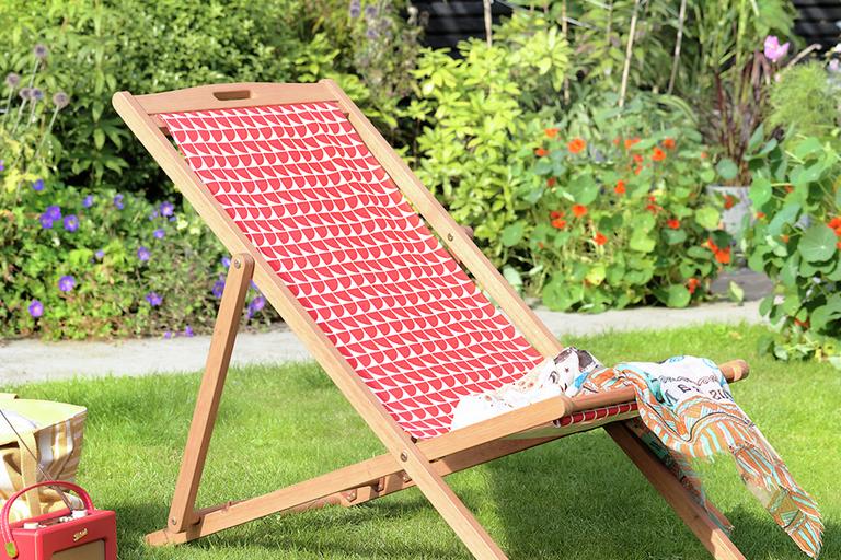Red patterned deck chair.