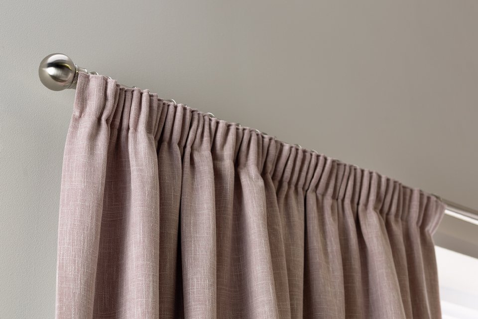 Pink blackout curtains.