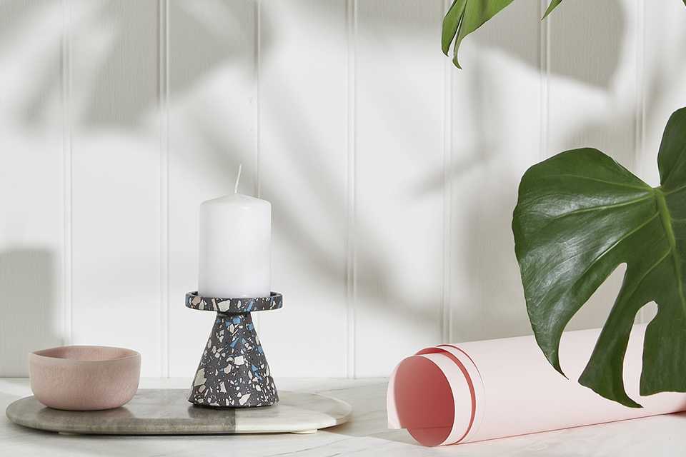 Concrete and terazzo candle stick holders.