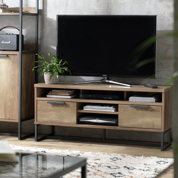 An industrial style TV unit in a living room.