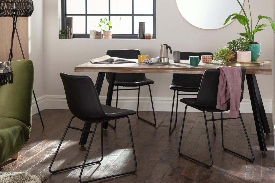 A Habitat Tribeca wood effect 6 seater dining table.