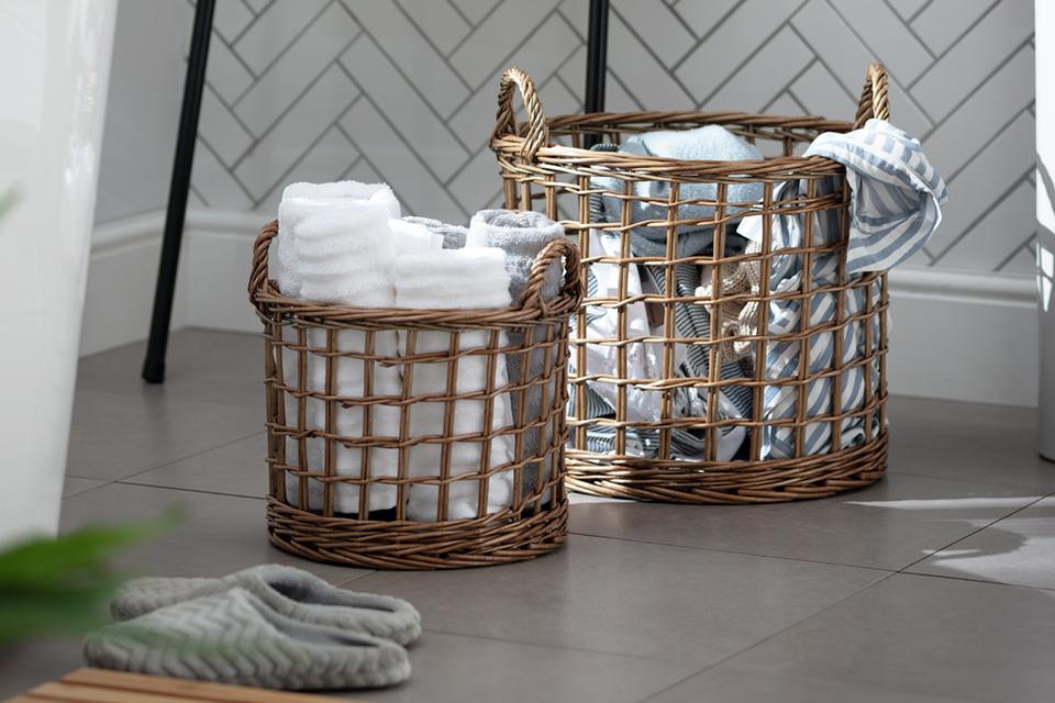Image of two wicker laundry baskets.