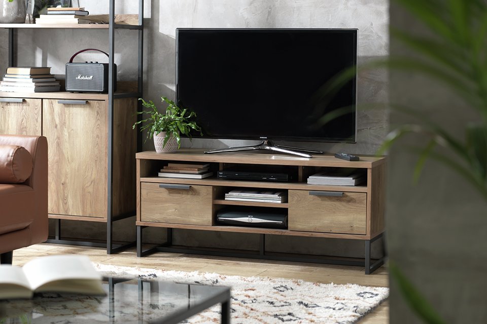 Wooden tv stand in living room.