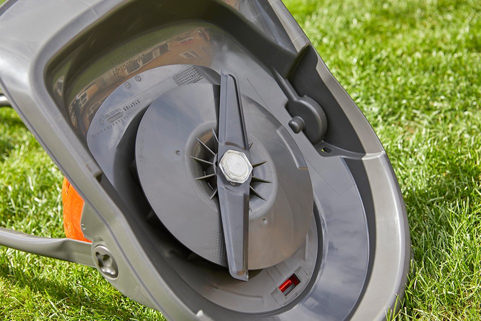 The bottom of a Flymo hover lawnmower.