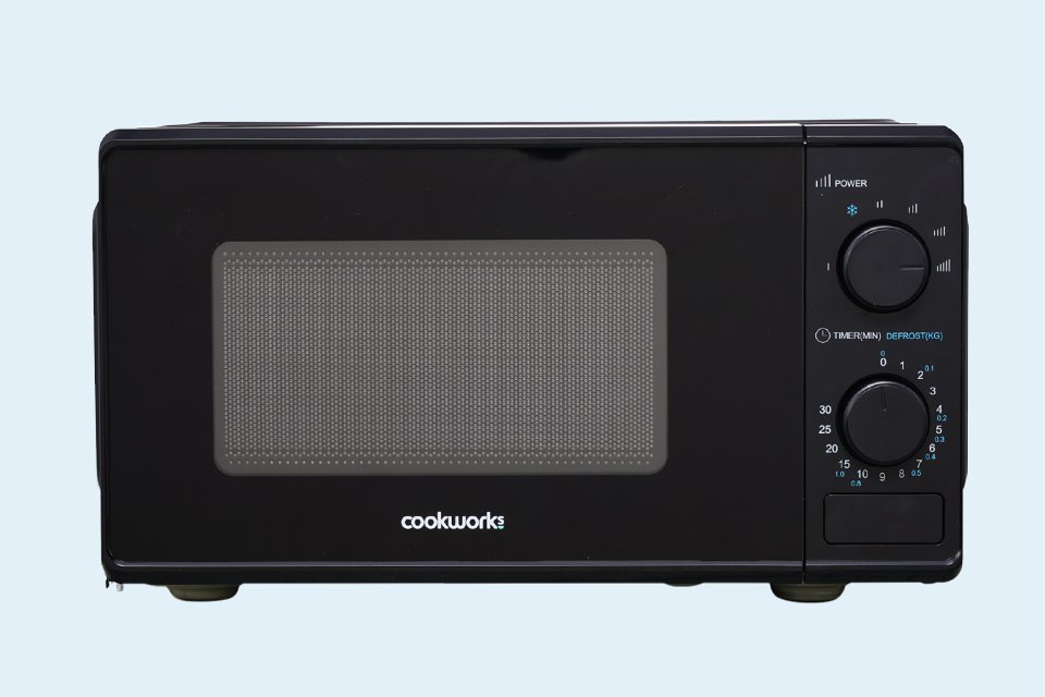 A Black Cookworks 700W microwave. 
