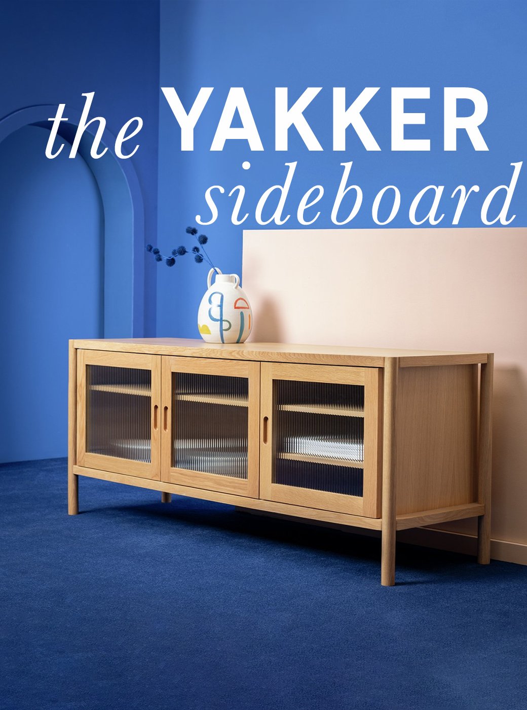 Habitat 60 yakker sideboard in oak and glass panels.