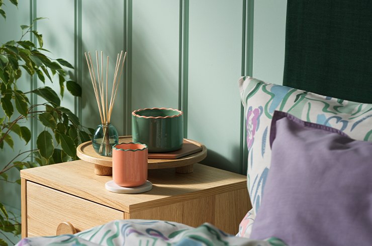 Bloosmbury manor trending bedding on Habitat with scalloped candle holders.