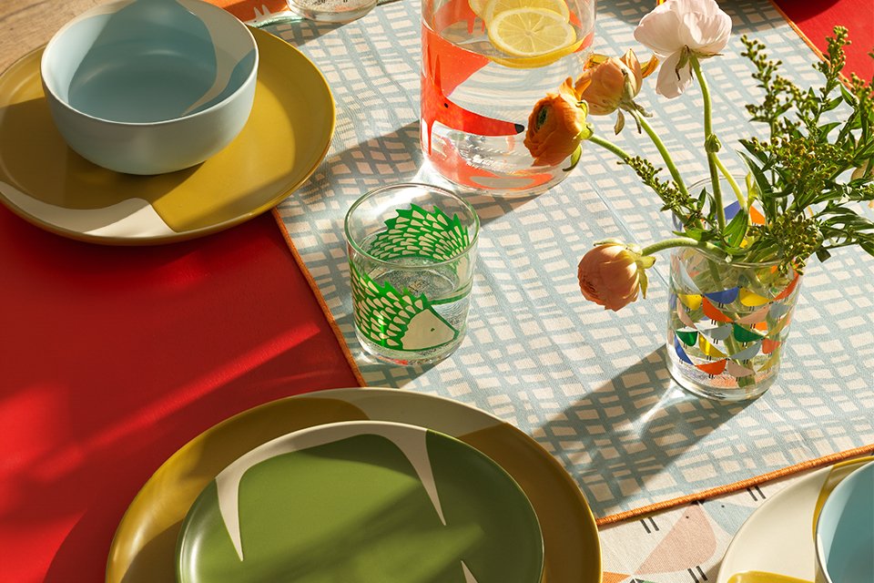 Wooden oak dining table and chairs with inbuild cushions.