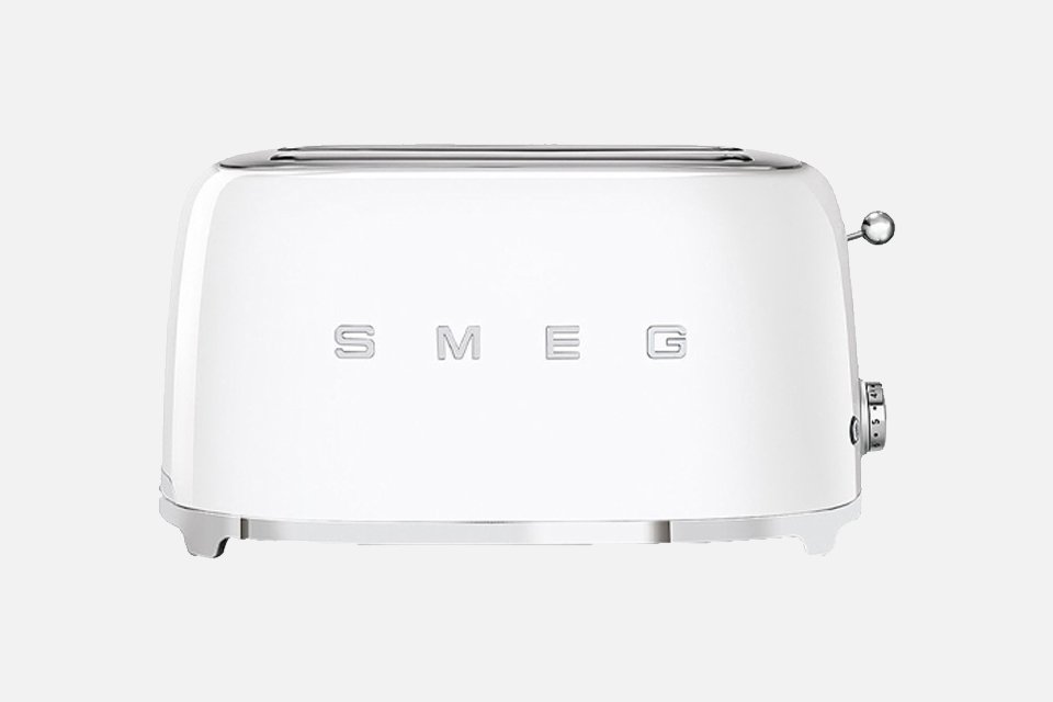 A Smeg white four slice toaster.