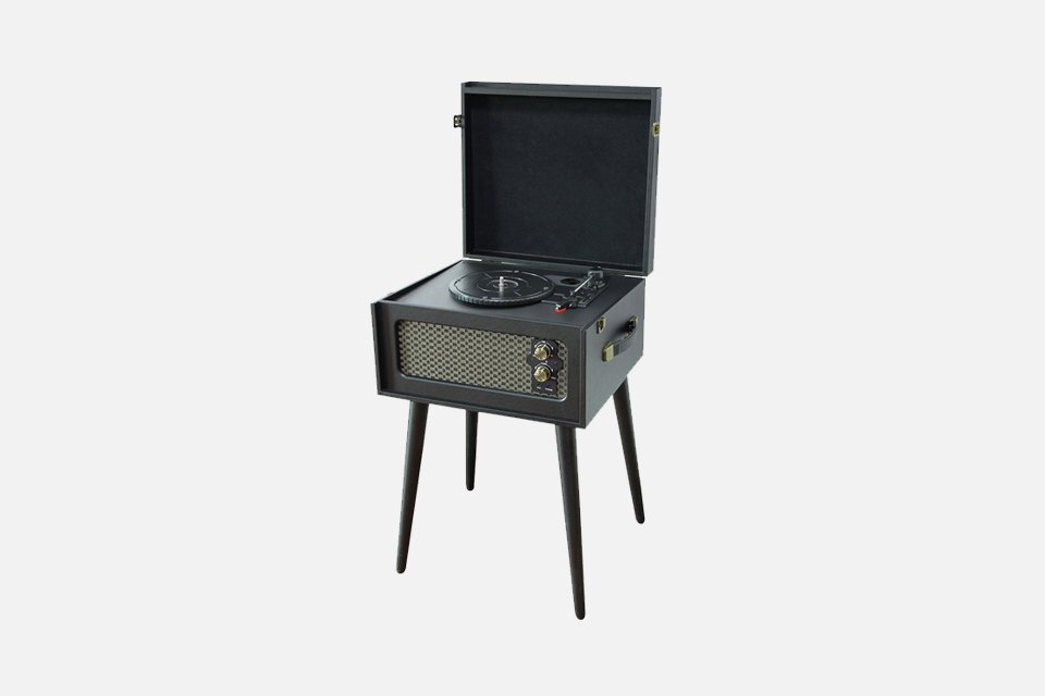 A Bush black wooden turntable with legs.