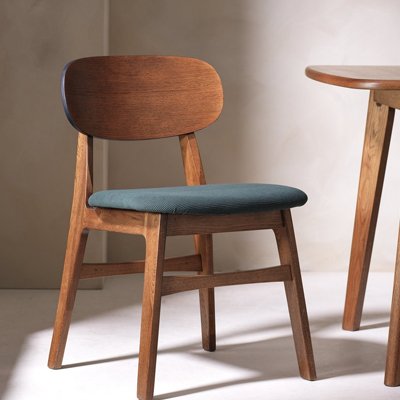 Oak brown dining chair with cushion seat.