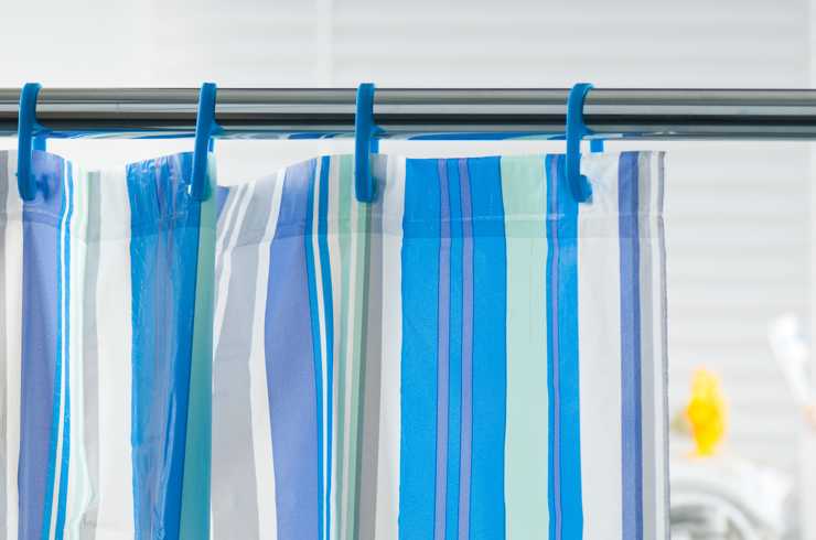 A stripy blue shower curtain.