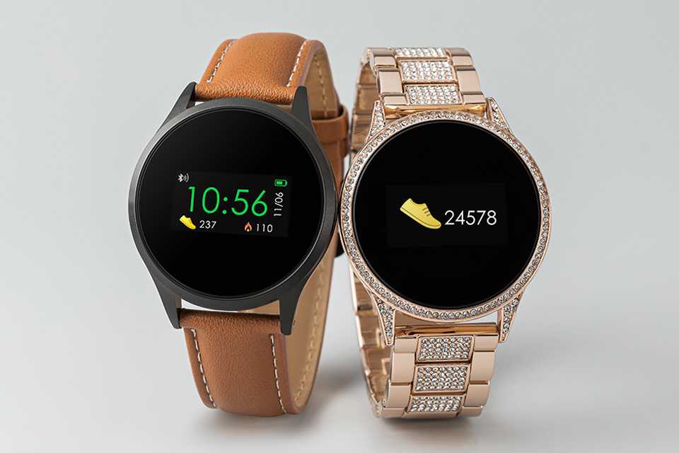 2 Reflex Active Series 4 smart watches with a leather strap and a golden bracelet.