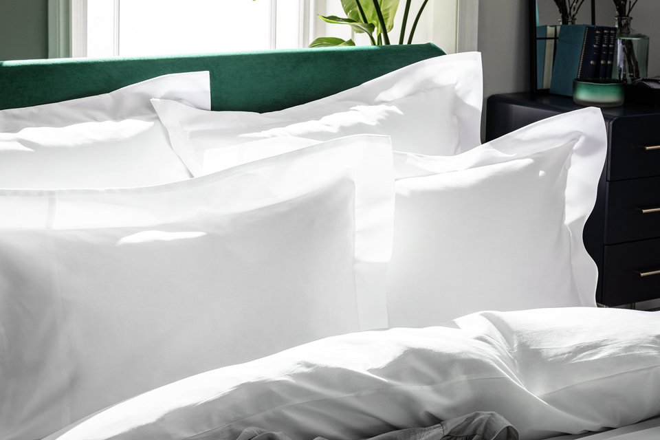 A set of white Egyptian cotton oxford pillowcases.