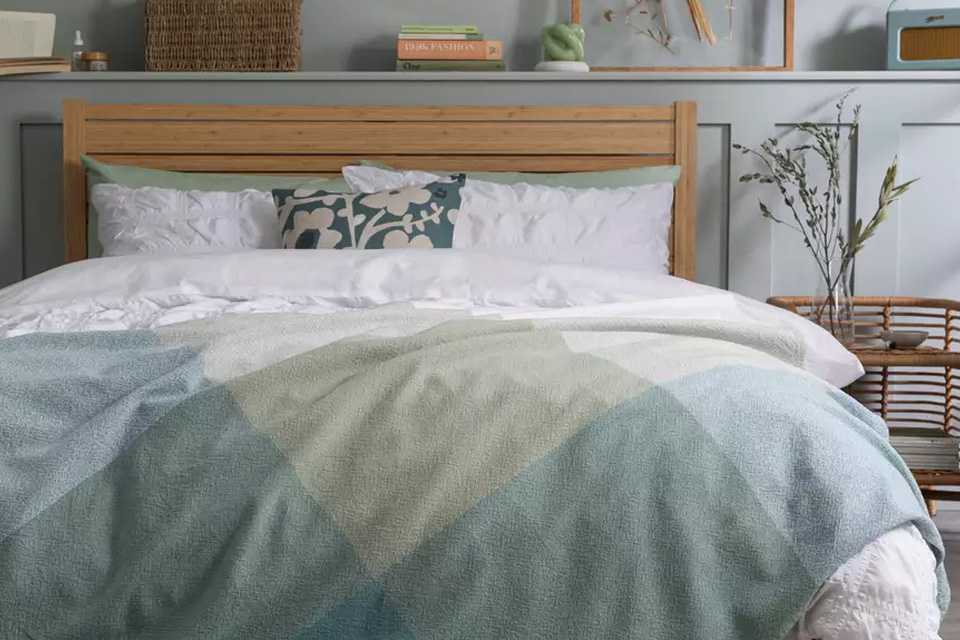 White and pastel coloured bedding.
