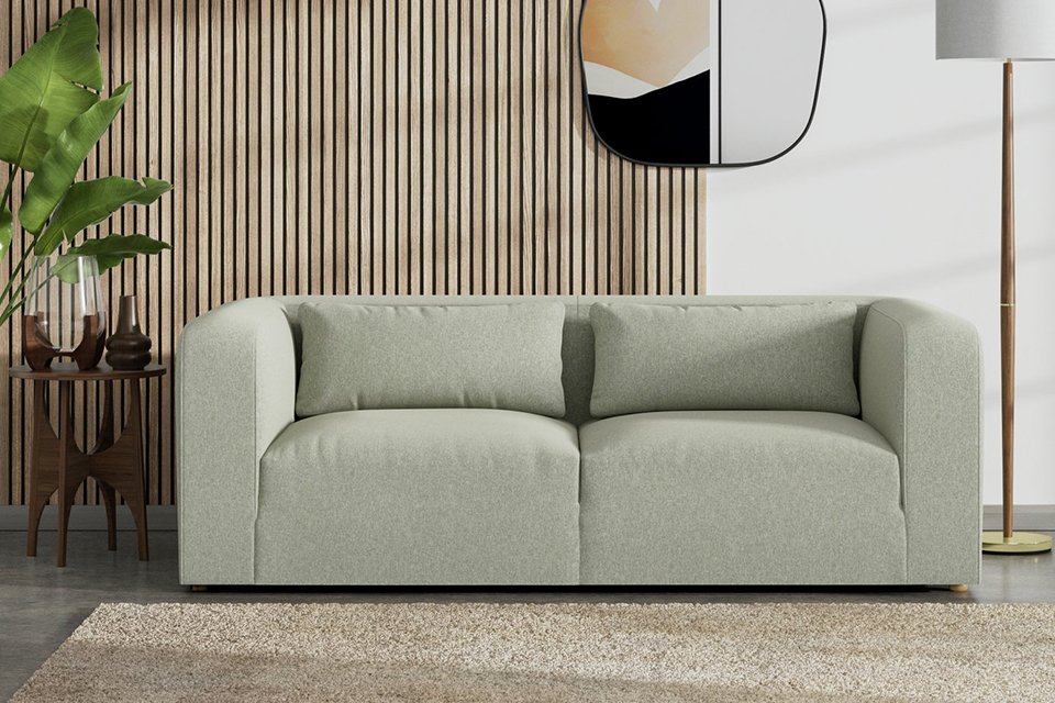 The lars sofa in sage green.