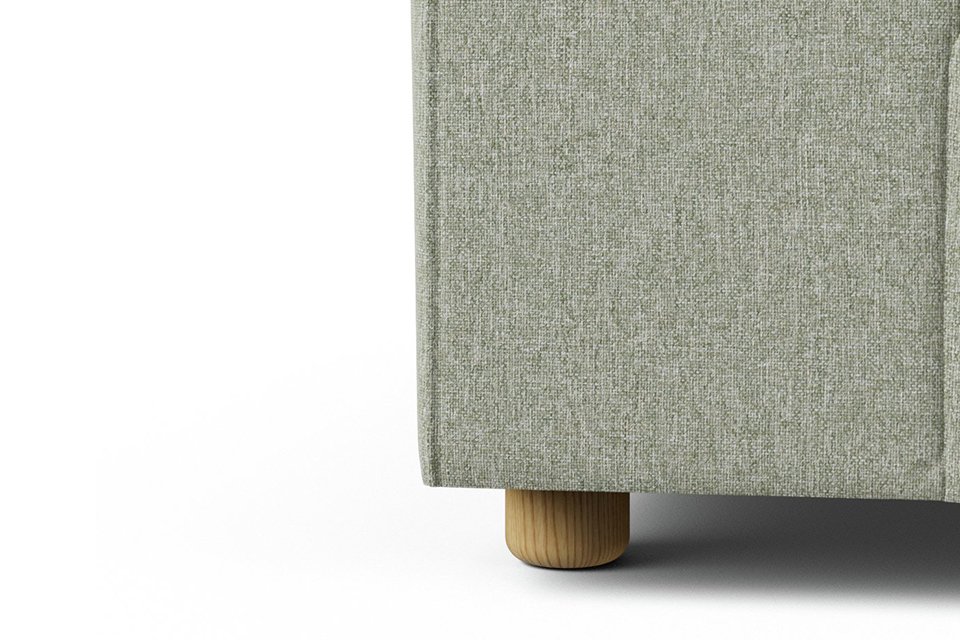 The lars sofa in sage green.