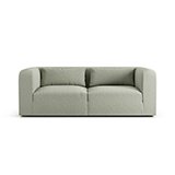 The Lars sofa in sage green.