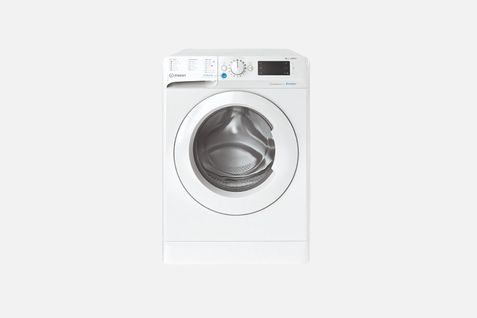 A white Indesit 10kg spin washing machine. 