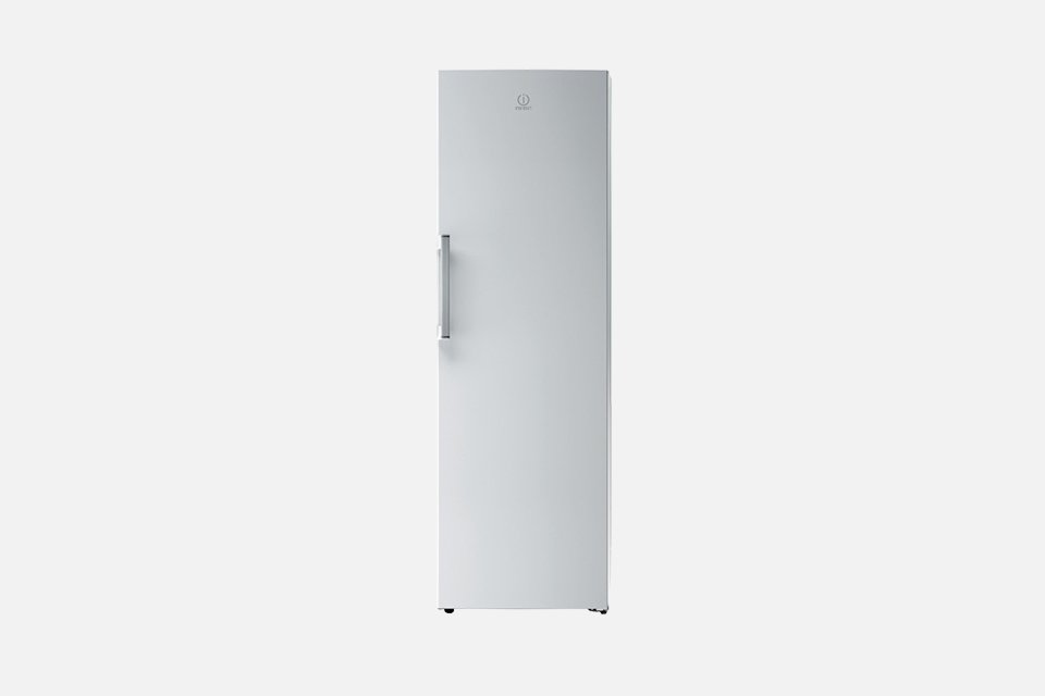 A white Indesit tall upright freestanding fridge. 