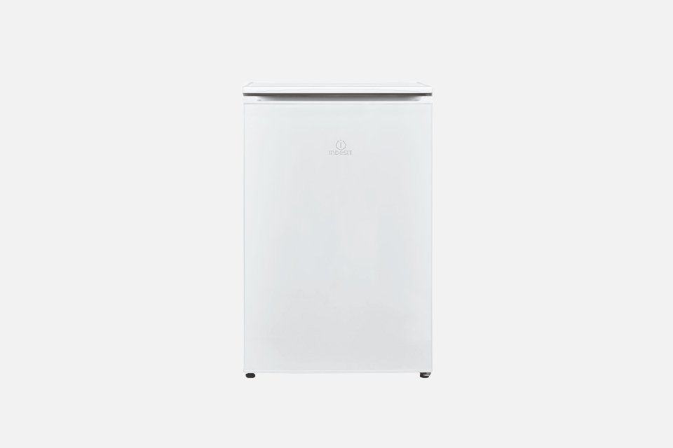 A white Indesit under counter freezer. 