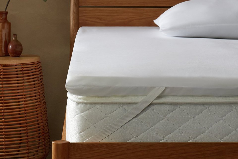 Argos Home 5cm Memory Foam Mattress Topper on a white mattress.