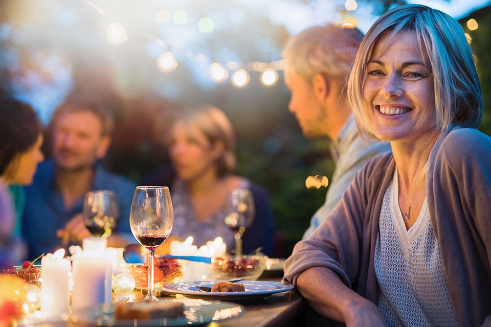 A group of friends partying in the garden.