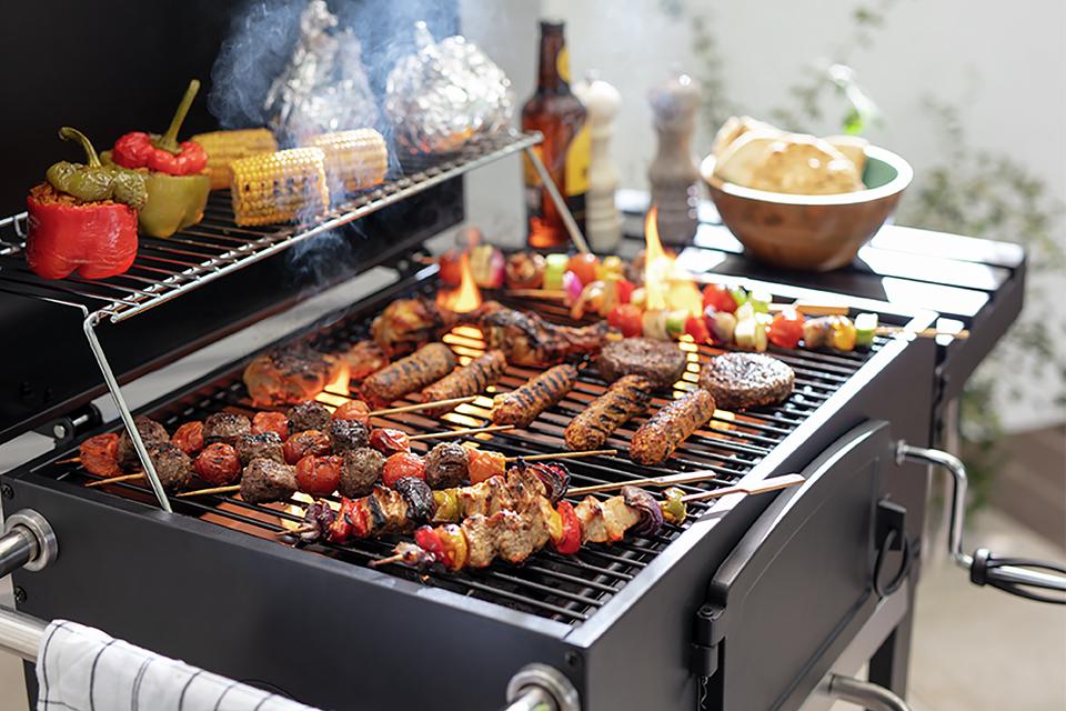 Barbecue sticks on a BBQ.