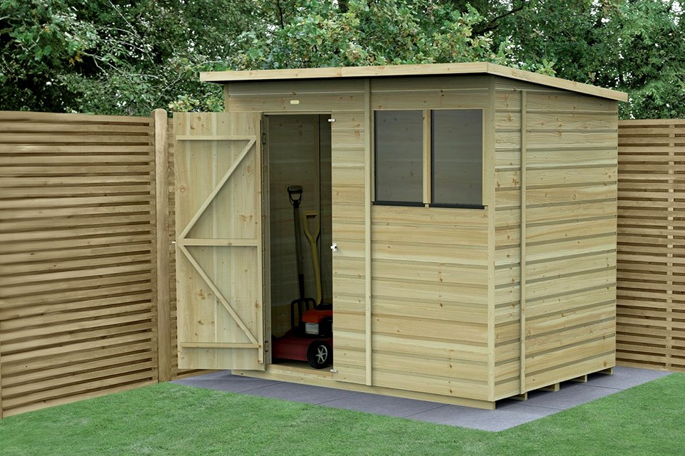 One door garden shed in garden setting